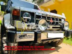Mitsubishi Pajero Mk1 Headlight washer nozzles